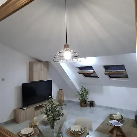 Apartmán Atico Giaco